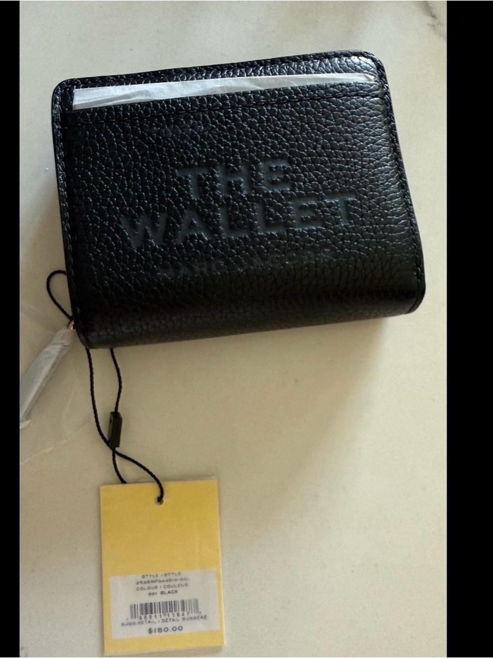 New with tags, Marc Jacob’s black bifold wallet w/sleeve-free shipping